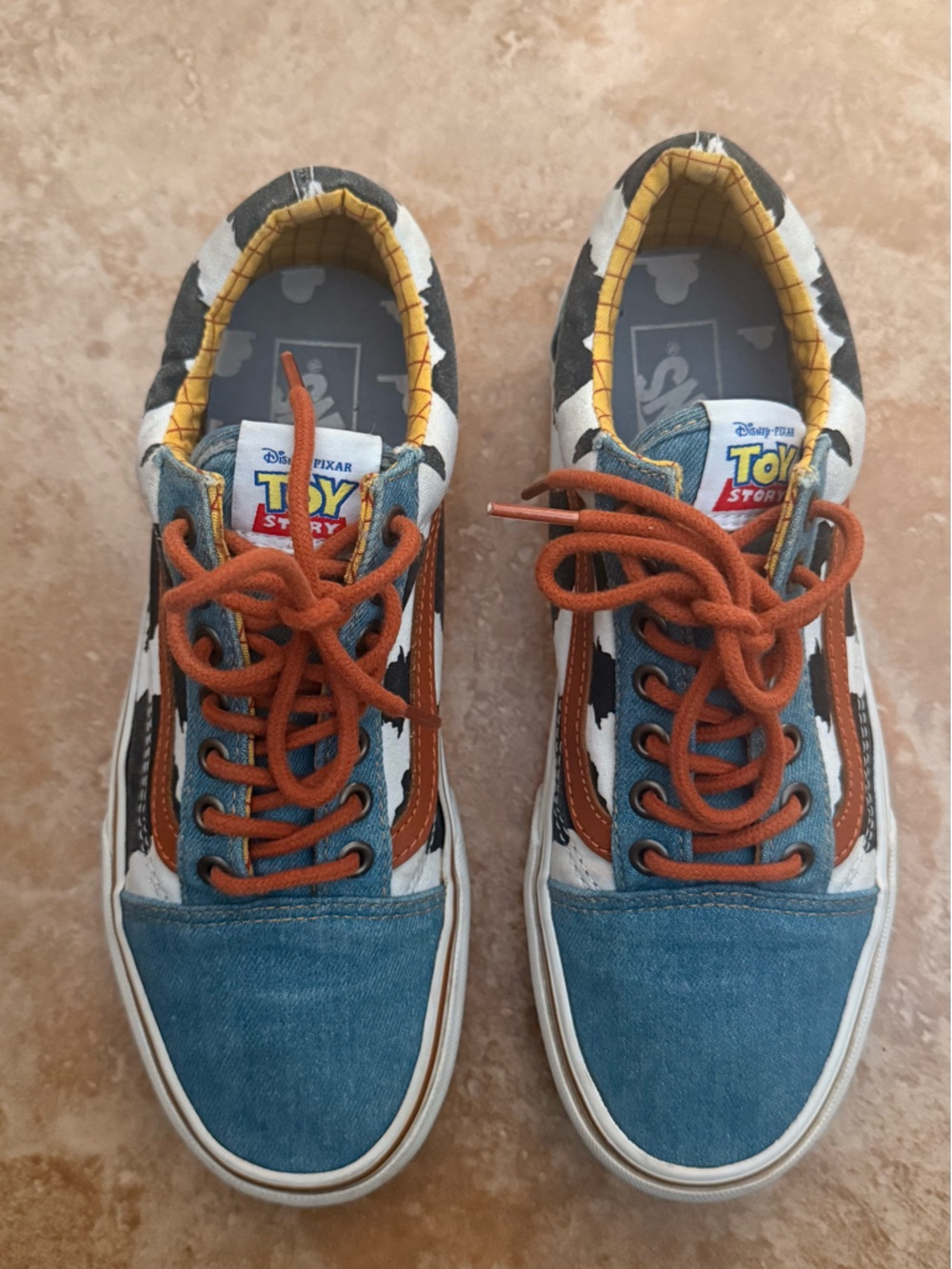 Vans Toy Story Low Top Sneakers in Blue, Yellow, Orange, Brown